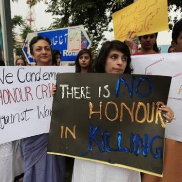 Members of civil society hold placards during a protest in Islamabad, Pakistan against a recent "honor" killing on May 29, 2014.