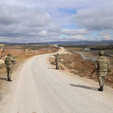 Turkish soldiers patrol in Hatay province along Turkey's new border wall with Syria in February 2016.
