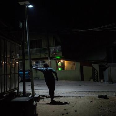A gay man in Bariga, a neighborhood in Lagos, Nigeria, who said he hides his identity from his friends and family.