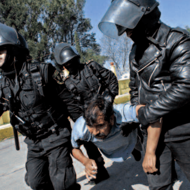 Police detain a protestor in San Salvador de Atenco, Mexico, May 2006. The CNDH conducted an investigation into allegations of human rights violations that occurred during this event. 
