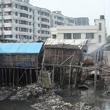 Slum houses in Hazaribagh beside an open gutter channeling untreated effluent from tanneries nearby. Local residents of Hazaribagh reported to Human Rights Watch an array of health problems—many of them undiagnosed due to the cost of medical attention—suc