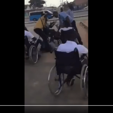 Video footage showing an Angolan police officer beating a peaceful protester in a wheelchair, Luanda, Angola, April 22, 2017.