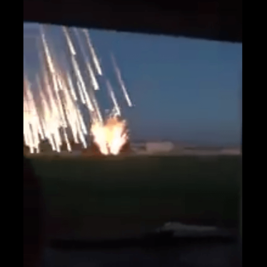 Screenshot of a video taken in April 2017 in Saraqeb, northwestern Syria, showing the bright trails produced by incendiary weapons. 