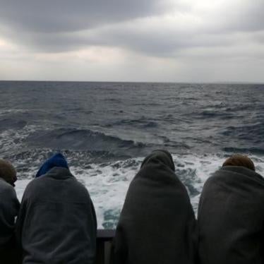 Migrants aboard a boat following their rescue from their drifting dinghies in the Mediterranean Seas by Spanish NGO Proactiva Open Arms