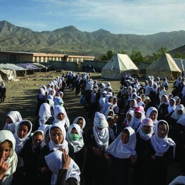 Girls gather to go home from school.