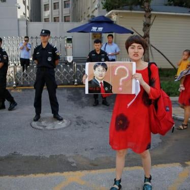 Li Wenzu, wife of lawyer Wang Quanzhang, who was detained in what is known as the "709" crackdown, joins others protesting in front of the Supreme People's Procuratorate in Beijing, China July 7, 2017.