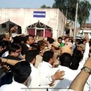 Lawyers clash with police outside a courthouse in India's Jammu and Kashmir state, April 9, 2018.