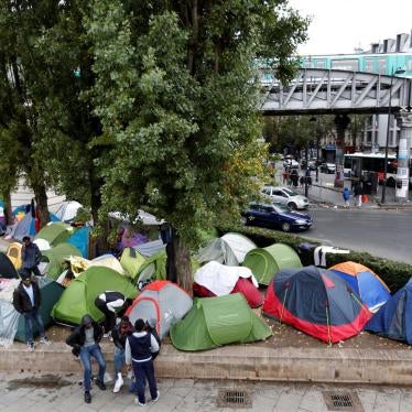 Tents are seen at a makeshift migrant camp on a street near the metro stations of Jaures and Stalingrad in Paris, France, October 28, 2016