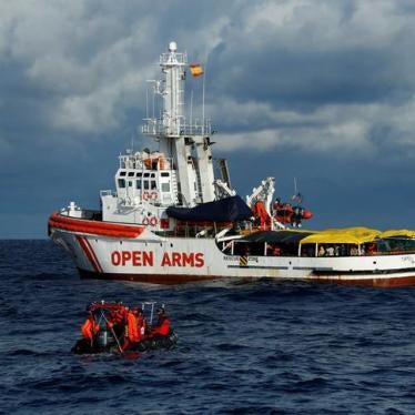 A rigid hulled inflatable boat (RHIB) approaches the MV Open Arms, the search and rescue ship of Proactiva Open Arms, in the central Mediterranean off the coast of Libya, December 16, 2017