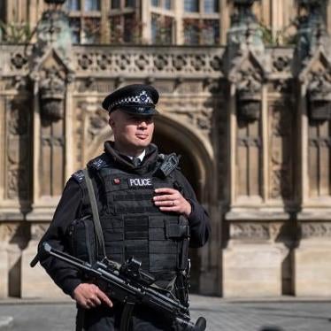 An armed police officer stands guard outside the Houses of Parliament in London, April 2017.