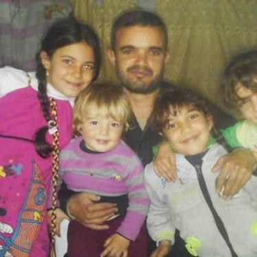 From left to right: Maria (10), Ahmad (2½), Aya (6), and Rama (8) with their father, Khalid al-Satuf. © 2019 Khalid al-Satuf