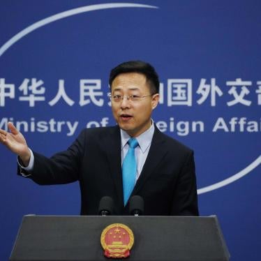 Chinese Foreign Ministry new spokesman Zhao Lijian gestures as he speaks during a daily briefing at the Ministry of Foreign Affairs office in Beijing, February 24, 2020. 