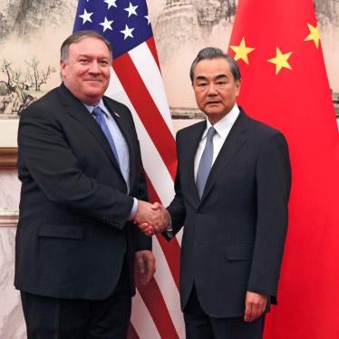 US Secretary of State Mike Pompeo, left, shakes hands with Chinese Foreign Minister Wang Yi before their meeting at the Diaoyutai State Guesthouse in Beijing, October 8, 2018.