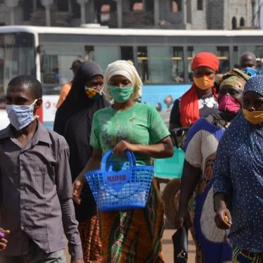 People wearing protective masks in the city of Conakry, Guinea, on April 29, 2020.