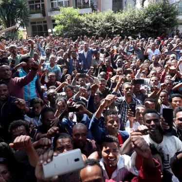 Oromo youth ​in Addis Ababa, Ethiopia gather outside the house of Jawar Mohammed, an Oromo activist, and influential figure during the 2015-2018 protests in the country. October 23, 2019. (c) 2019 REUTERS/Tiksa Negeri​
