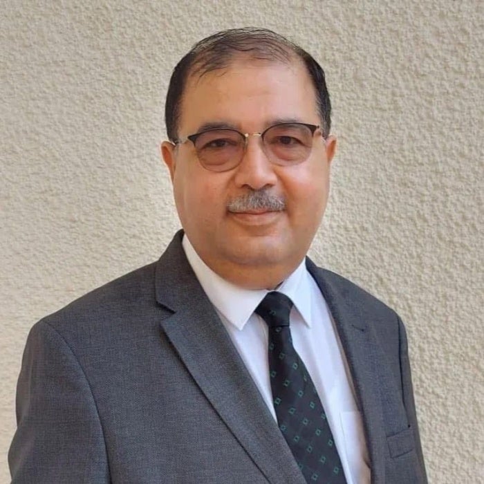 Photo of a man in a suit